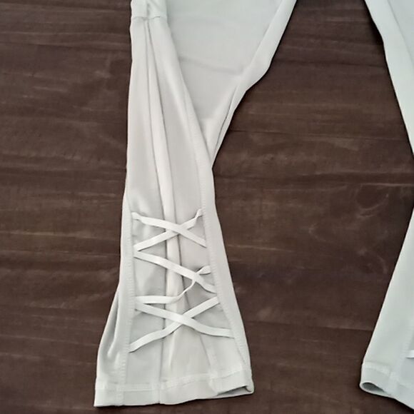 High waist light green leggings size large mesh laced ankles small stain on righ - Picture 2 of 4